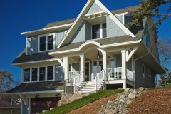 Angled exterior shot of the front of a home with many Vector windows installed