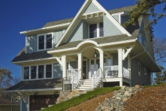 Angled exterior shot of the front of a home with many Vector windows installed