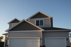 New construction home featuring Vector windows