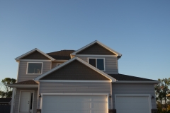 New construction home featuring Vector windows