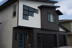 Custom window paneling on a modern home