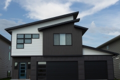 Custom window paneling on a modern home