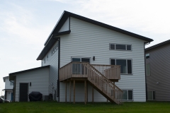 Two story home with vector windows