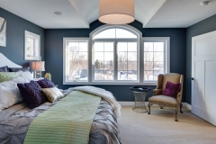 Large beautiful window installation in a master bedroom
