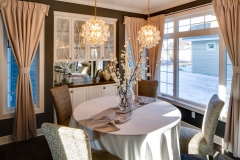 Quaint breakfast nook with a large window