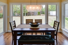 dining area with floor-to-ceiling windows