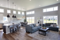 Natural lighting floods an open-concept home with many custom Vector windows