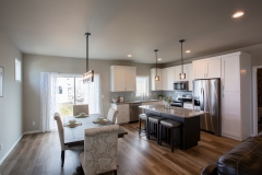 Kitchen and dining room with a sliding door