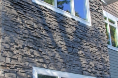 Large home exterior with many Vector windows