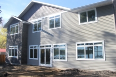 Large home exterior with many Vector windows
