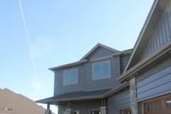 Vector windows on second story of home