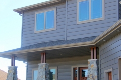 Vector windows on second story of home
