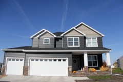New construction home featuring Vector windows